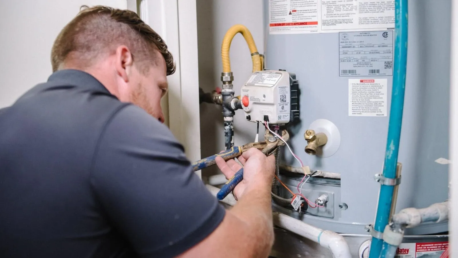 Professional water heater service including diagnostic testing and repair for a residential gas water heater